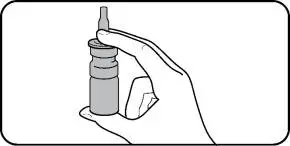 Step 3.  Hold the nasal spray upright.  Place one finger on each side of the base of the nasal applicator and your thumb underneath the bottle.