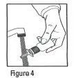 Figure 4: Hold the nasal tip under running, warm tap water (illustrated direction)