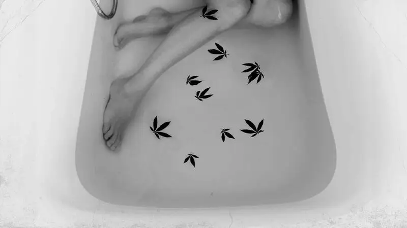 Cannabis leaves floating in bathwater
