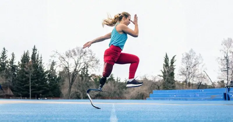 a woman with prosthetic leg doing strength training workout outdoor