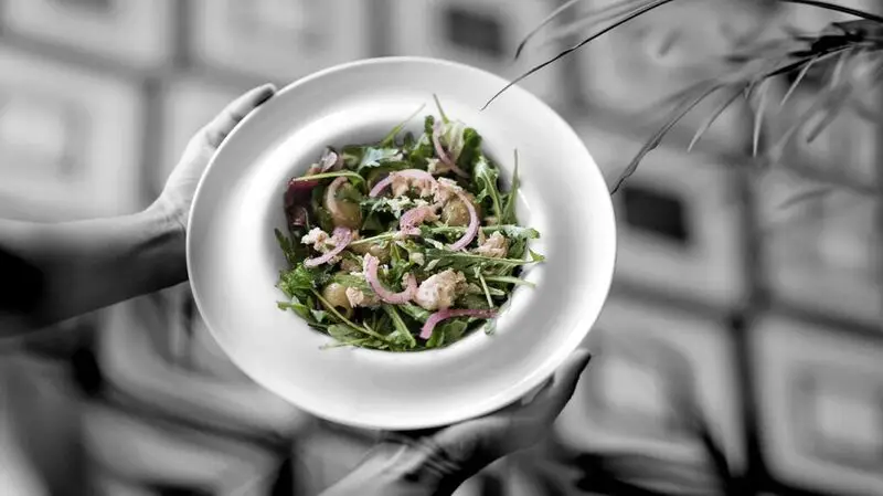 color pop photograph highlighting tuna salad on a white plate