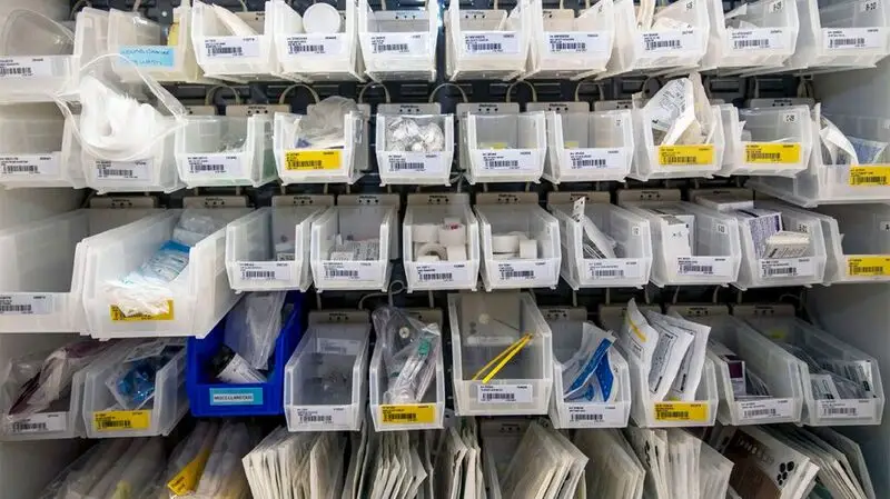 plastic boxes of medical supplies