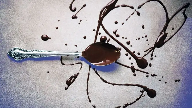 Melted chocolate on a spoon