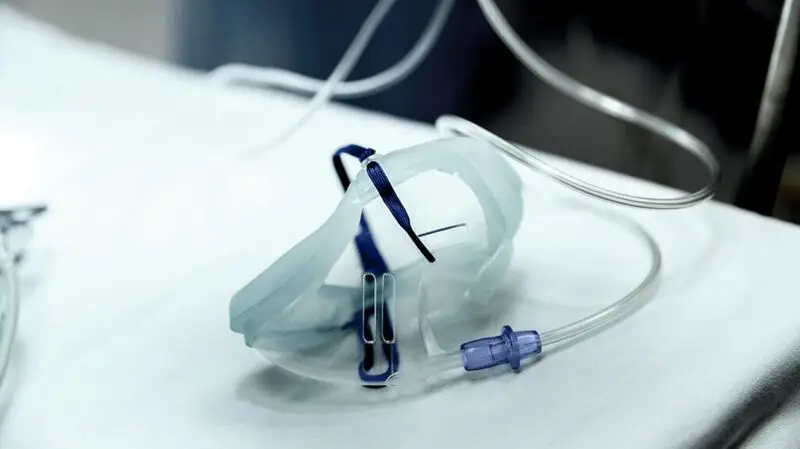 An oxygen mask on a surface at a hospital