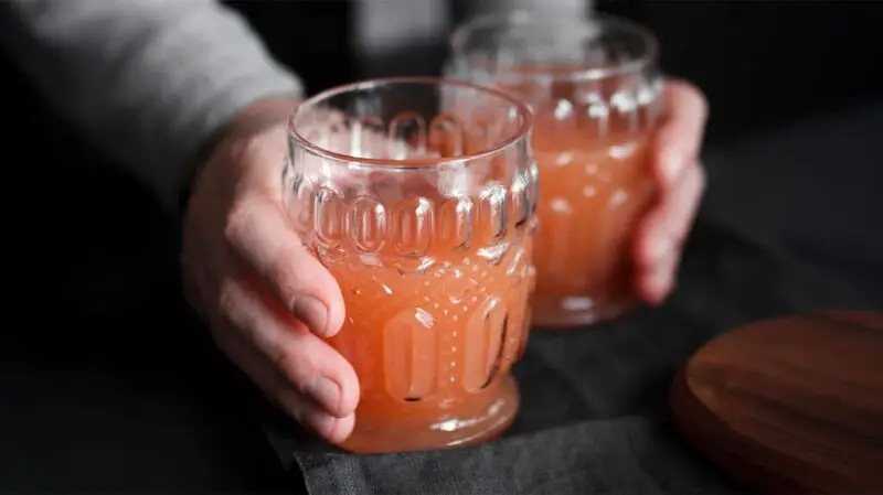 two glasses of artificially colored juice