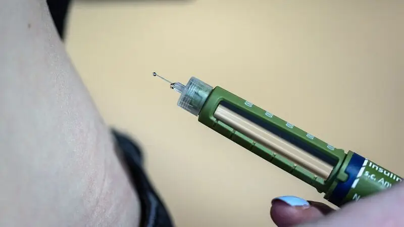 A close-up of an injection used to treat type 2 diabetes, such as insulin or liraglutide
