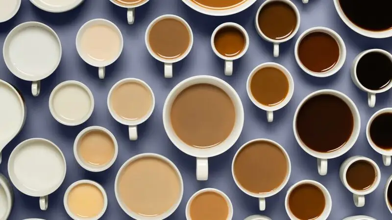 cups of water, coffee, and tea seen from above