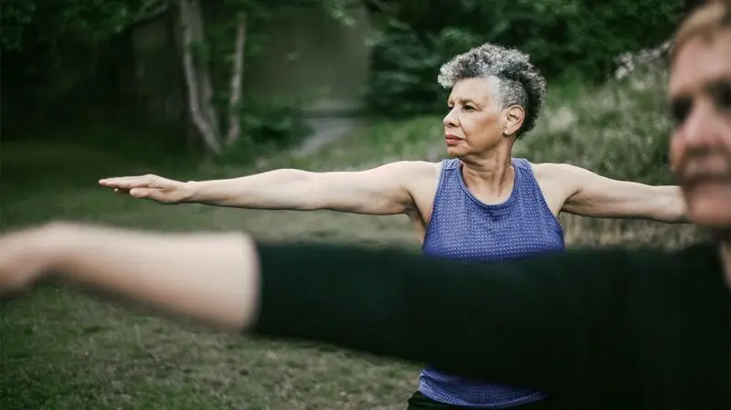 older women exercising outdoors