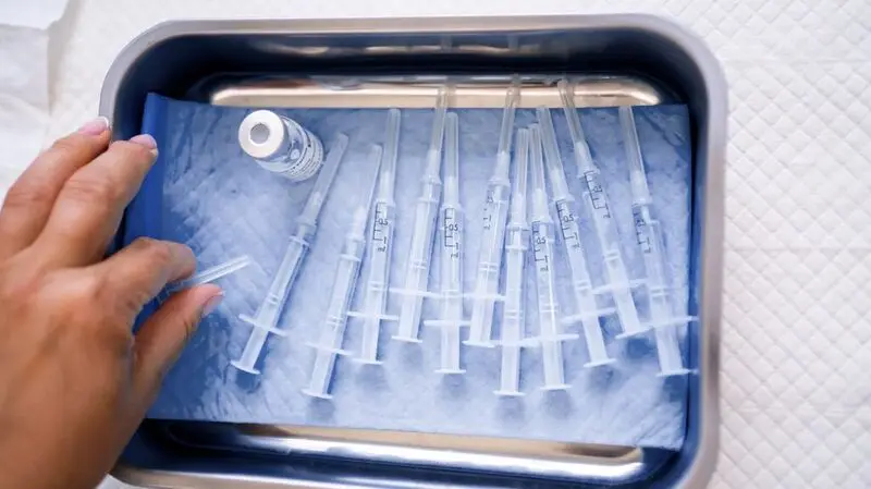 Shingles vaccines on a metal tray