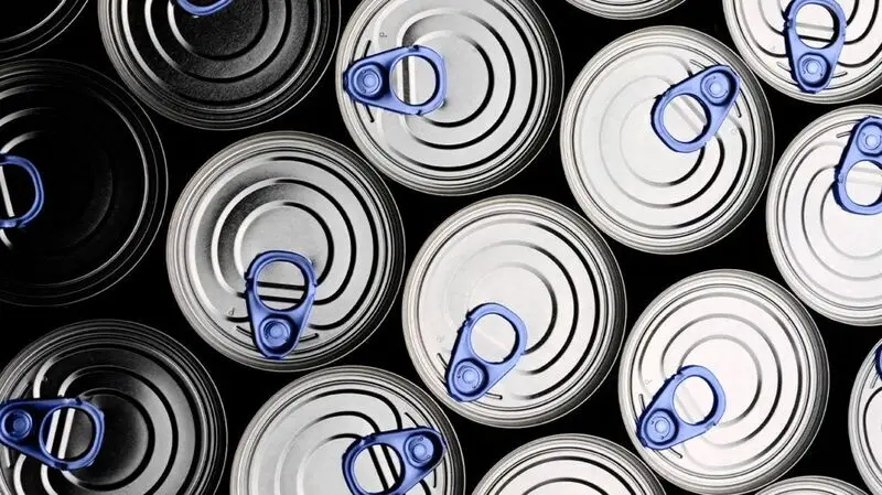 Overview of canned goods with blue tabs