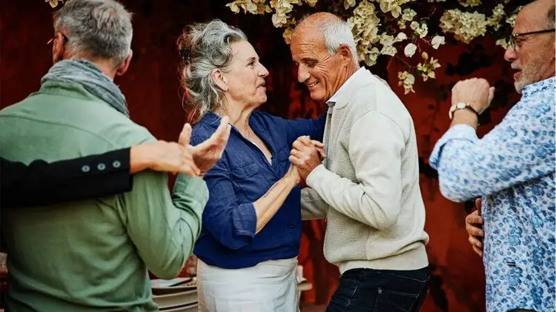 older couple dancing at a party