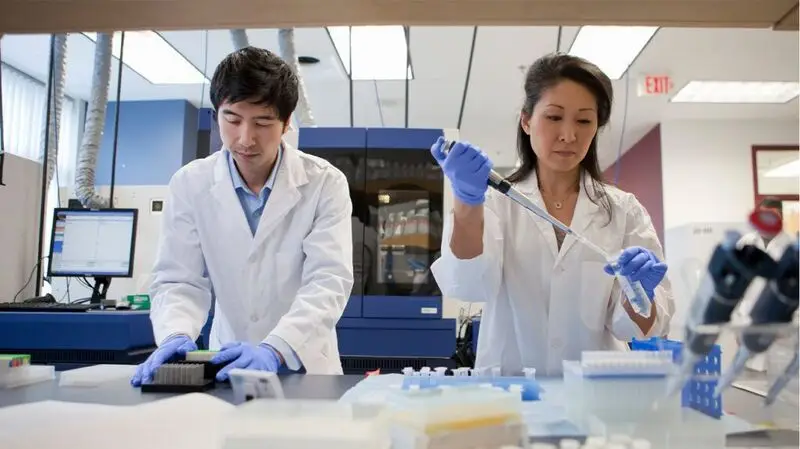Researchers working in a lab.