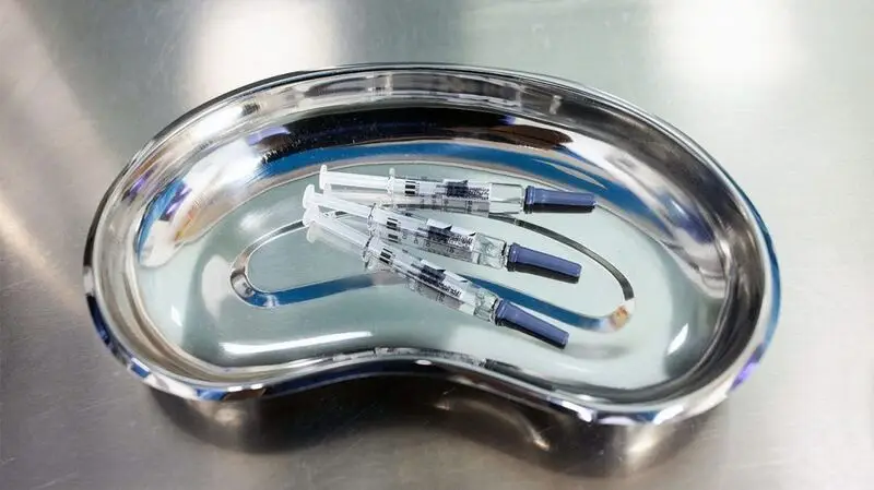 flu vaccine doses on sterile tray