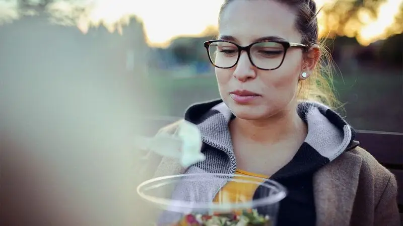 young white woman with glasses