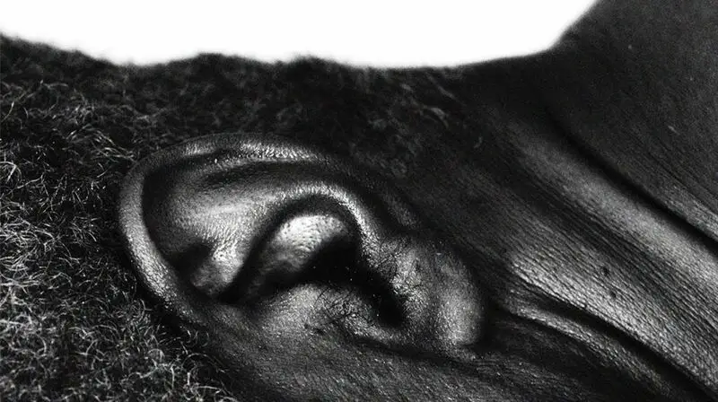closeup of Black person's ear