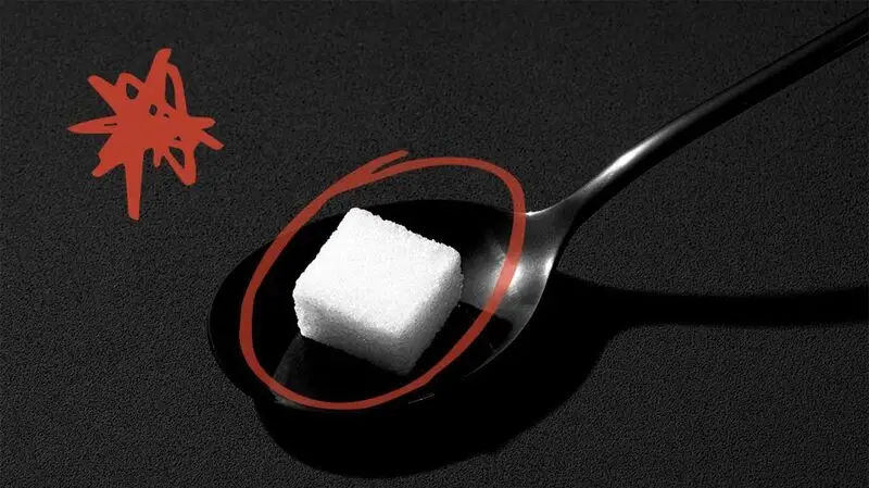 close-up of sugar cube on teaspoon