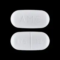 Amoxicillin and clavulanate (Amoxicillin and clavulanate potassium [ am-ok-i-sil-in-klav-ue-lan-ate-poe-tas-ee-um ])-875 125 AMC-875 mg / 125 mg-White-Oval