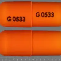 Fenofibrate (Fenofibrate [ fen-oh-fye-brate ])-G 0533 G 0533-200 mg-Orange-Capsule-shape