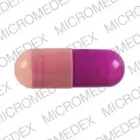 Prilosec (Omeprazole [ oh-mep-ra-zol ])-606 PRILOSEC 10-10 mg-Pink & Purple-Capsule-shape