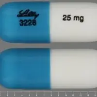 Strattera (Atomoxetine [ at-oh-mox-e-teen ])-LILLY 3228 25 mg-25 mg-Blue & White-Oval