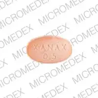 Xanax (Alprazolam [ al-pray-zoe-lam ])-XANAX 0.5-0.5 mg-Orange-Oval