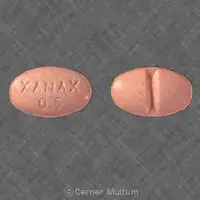 Xanax (Alprazolam [ al-pray-zoe-lam ])-XANAX 0.5-0.5 mg-Orange-Oval