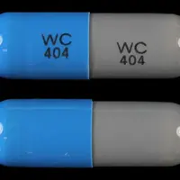 Ampicillin (Ampicillin (oral) [ am-pi-sil-in ])-WC 404 WC 404-500 mg-Blue & Gray-Capsule-shape