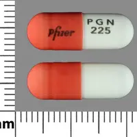 Lyrica (Pregabalin [ pre-gab-a-lin ])-Pfizer PGN 225-225 mg-Orange & White-Capsule-shape