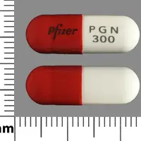 Lyrica (Pregabalin [ pre-gab-a-lin ])-Pfizer PGN 300-300 mg-Orange & White-Capsule-shape