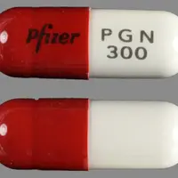 Lyrica (Pregabalin [ pre-gab-a-lin ])-Pfizer PGN 300-300 mg-Orange & White-Capsule-shape