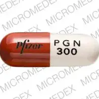 Lyrica (Pregabalin [ pre-gab-a-lin ])-Pfizer PGN 300-300 mg-Orange & White-Capsule-shape