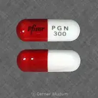 Lyrica (Pregabalin [ pre-gab-a-lin ])-Pfizer PGN 300-300 mg-Orange & White-Capsule-shape