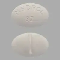 Medrol (Methylprednisolone (oral) [ meth-il-pred-nis-oh-lone ])-MEDROL 32-32 mg-White-Oval