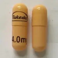 Ninlaro (Ixazomib [ ix-az-oh-mib ])-Takeda 4.0 mg-4.0 mg-Orange-Capsule-shape