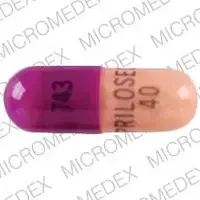 Prilosec (Omeprazole [ oh-mep-ra-zol ])-743 PRILOSEC 40-40 mg-Pink / Purple-Capsule-shape