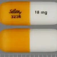 Strattera (Atomoxetine [ at-oh-mox-e-teen ])-LILLY 3238 18 mg-18 mg-Gold & White-Capsule-shape