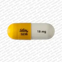 Strattera (Atomoxetine [ at-oh-mox-e-teen ])-LILLY 3238 18 mg-18 mg-Gold & White-Capsule-shape