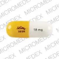 Strattera (Atomoxetine [ at-oh-mox-e-teen ])-LILLY 3238 18 mg-18 mg-Gold & White-Capsule-shape