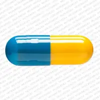 Strattera (Atomoxetine [ at-oh-mox-e-teen ])-LILLY 3239 60 mg-60 mg-Blue & Yellow-Capsule-shape