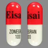 Zonegran (Zonisamide [ zoe-nis-a-mide ])-Eisai ZONEGRAN 100-100 mg-Red & White-Capsule-shape