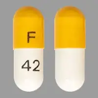 Atomoxetine (Atomoxetine [ at-oh-mox-e-teen ])-F 42-18 mg-White & Yellow-Capsule-shape