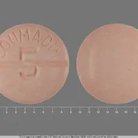 Coumadin (Warfarin (oral) [ war-far-in ])-COUMADIN 5-5 MG-Orange-Round