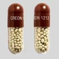 Creon (Pancrelipase [ pan-kre-lye-pace ])-CREON 1212-60,000 units amylase / 12,000 units lipase / 38,000 units protease-Brown / Clear-Capsule-shape