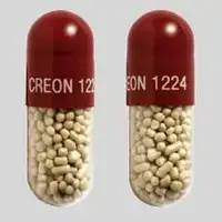 Creon (Pancrelipase [ pan-kre-lye-pace ])-CREON 1224-120,000 units amylase / 24,000 units lipase /  76,000 units protease-Orange / Clear-Capsule-shape