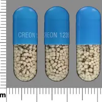 Creon (Pancrelipase [ pan-kre-lye-pace ])-CREON 1236-180,000 units amylase / 36,000 units lipase / 114,000 units protease-Blue / Clear-Capsule-shape