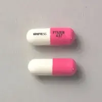 Minipress (Prazosin [ pra-zoe-sin ])-MINIPRESS PFIZER 437-2 mg-Pink & White-Capsule-shape