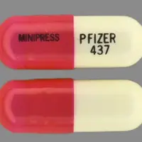 Minipress (Prazosin [ pra-zoe-sin ])-MINIPRESS PFIZER 437-2 mg-Pink & White-Capsule-shape