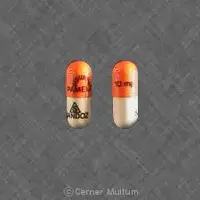 Pamelor (Nortriptyline [ nor-trip-ti-leen ])-logo PAMELOR 10 mg logo SANDOZ-10 mg-Orange / White-Capsule-shape