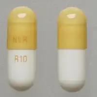 Ritalin la (Methylphenidate (oral) [ meth-il-fen-i-date ])-NVR R10-10 mg-White / Brown-Capsule-shape