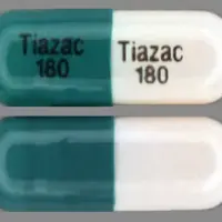 Tiazac (Diltiazem [ dil-tye-a-zem ])-Tiazac 180 Tiazac 180-180 mg-Turquoise & White-Capsule-shape